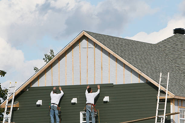 Professional Siding technician working in Pine, CO